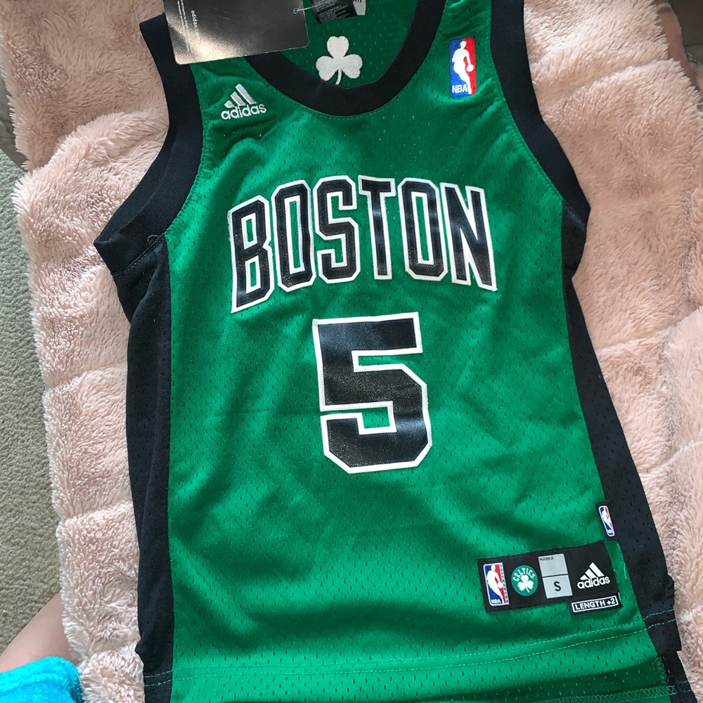 Woman’s Celtics jersey new with tags